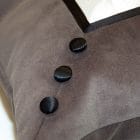Detail of the pillow Two is Better, gray velvet corner with three black satin buttons