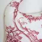 Logo of embroidered two birds on the dog Adelaide