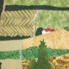 Detail of the piece of textile art The 3rd road. View of a house in the countryside through the valleys.