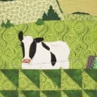 Detail of the piece of textile art The 3rd road. White and black cow in foreground on the edge of the fence.
