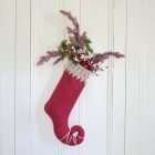 Christmas stocking Princess Cyrielle garnished with Christmas decorations.
