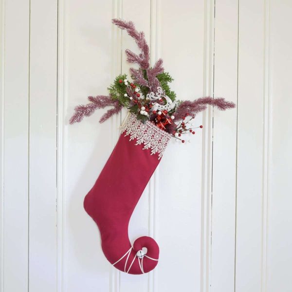 Christmas stocking Princess Cyrielle garnished with Christmas decorations.