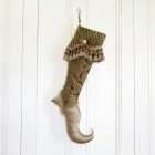 Zefirino elf stocking made with luxurious gold fabrics, fringe and jewelry.