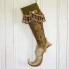 Zefirino Christmas stocking made with luxurious gold fabrics, bangs and jewelry.