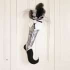 Elf stocking Estrella garnished of Holiday decorations. Silver, black and white stocking.