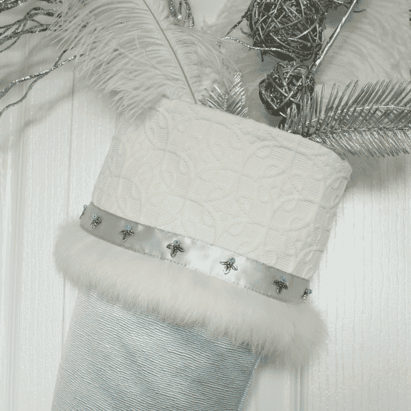 Detail of the Elf stocking Celestia, top of stocking with decorative accessories.