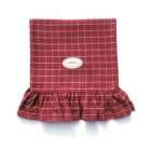 Red plaid throw with gathered frill.