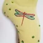 Embroidered dragonfly, sequins and beads on the foot of the Christmas stocking Zana