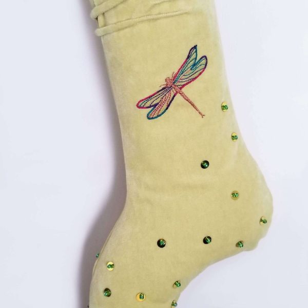 Dragonfly on the ankle of the Christmas stocking Zana
