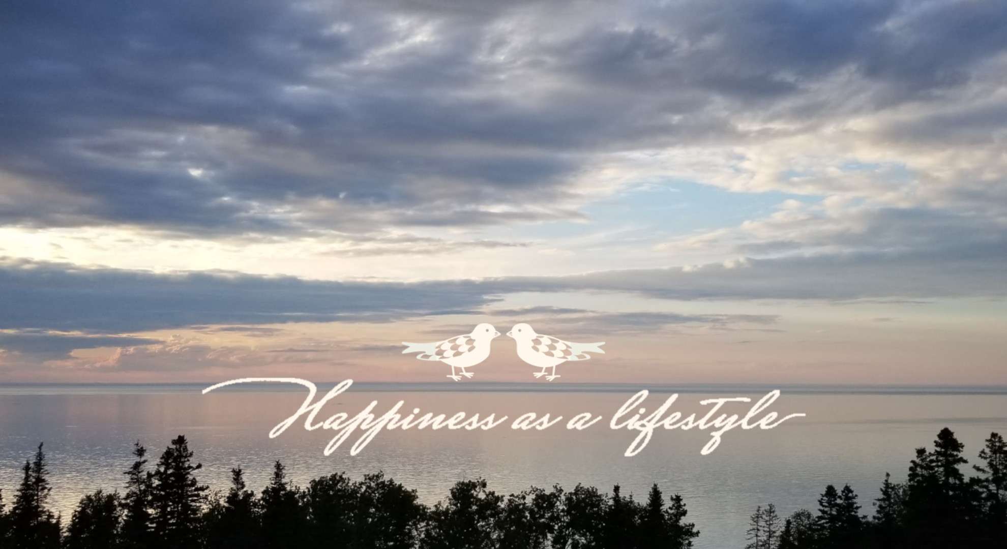 Sunset over the river with the slogan Happiness as a lifestyle