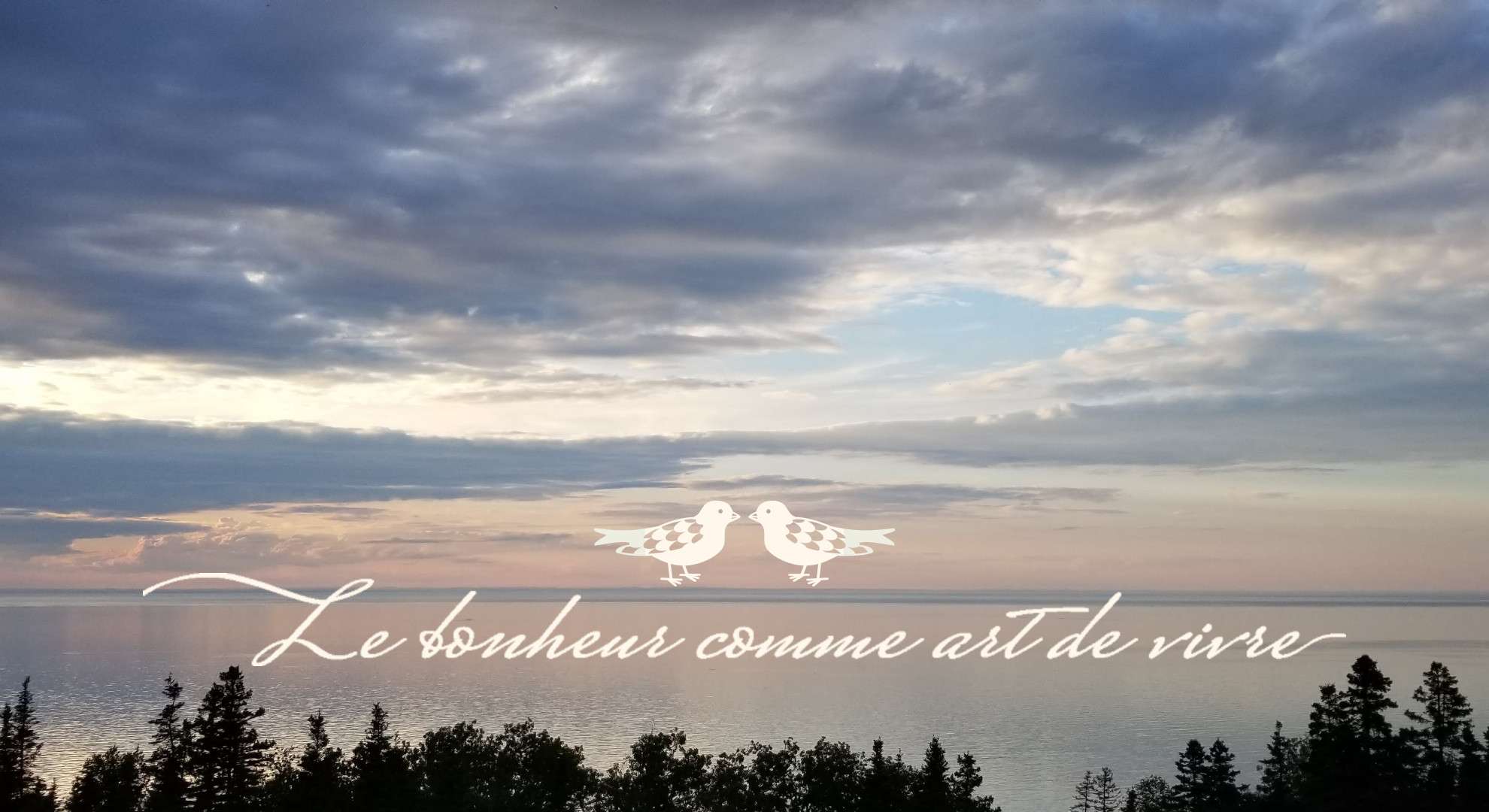 Coucher de soleil au dessus du fleuve avec le slogan Le bonheur comme art de vivre