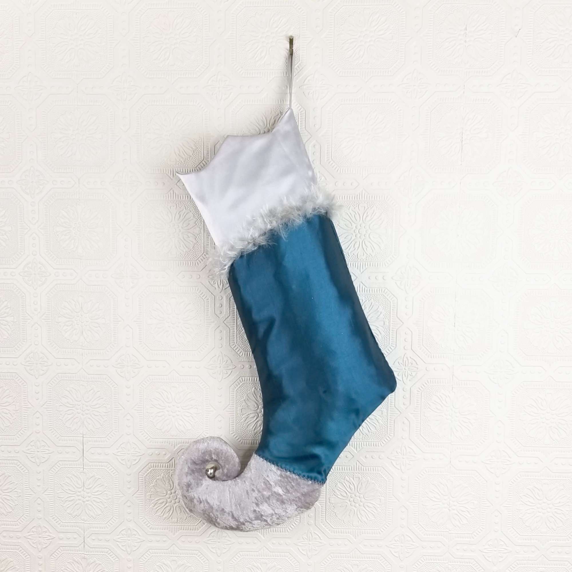 Christmas stocking Comet turquoise and silver with a curved foot