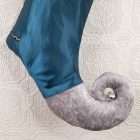 Curly foot of the Christmas stocking Comet in grey velvet with a silver bell