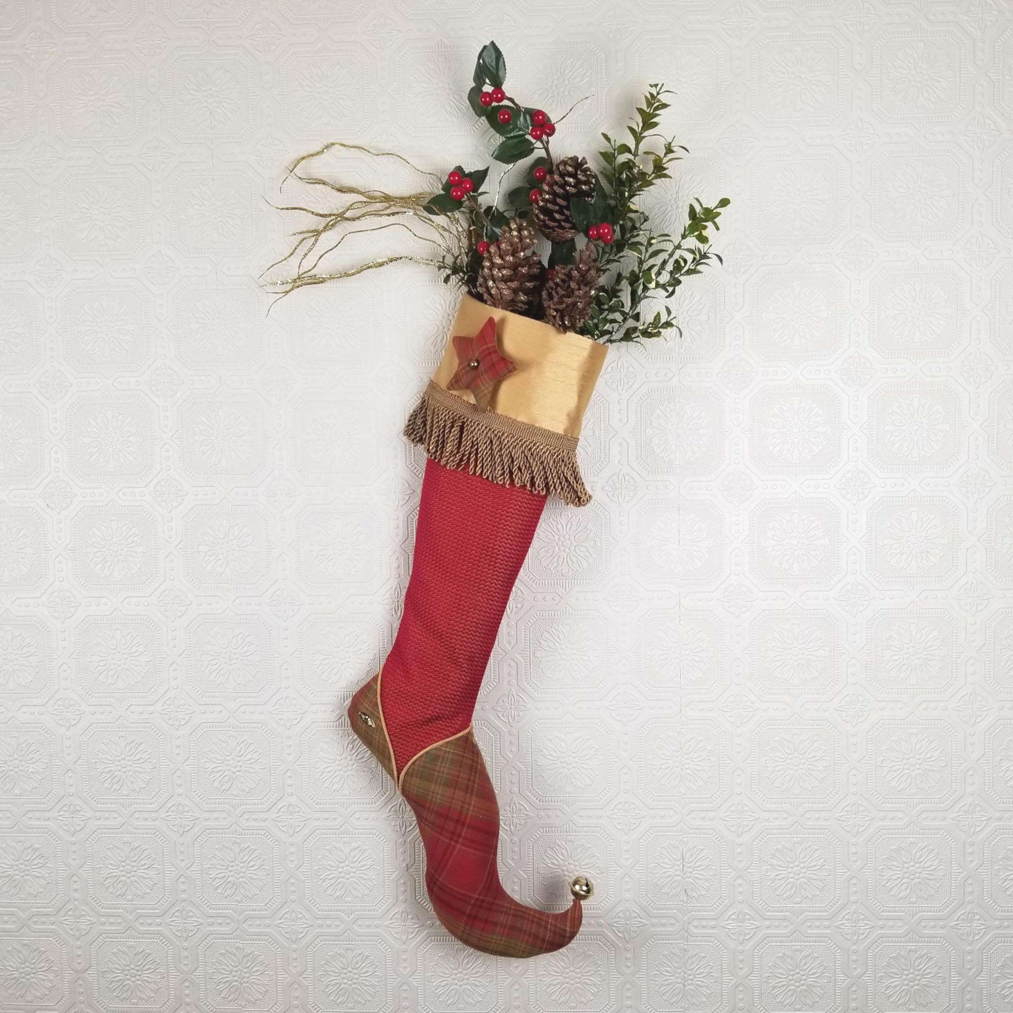 Red and gold Christmas stocking Firmin with Christmas decorations