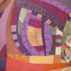 Tableau d'art textile abstrait symbolique La Bête, détail avec broderie à la main et piquage machine.